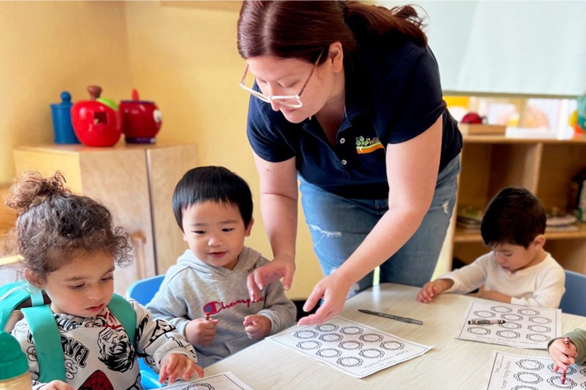 Teacher leading a classroom activity at Academy on the Hills in Aliso Viejo