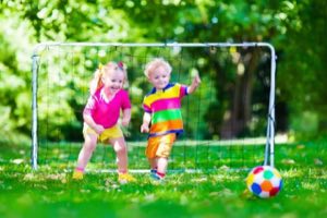 Children playing soccer in weekly group sessions at Academy on the Hills in Aliso Viejo