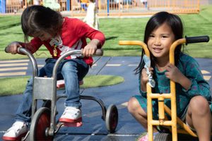 Pre-K children playing together outdoors at Academy on the Hills in Aliso Viejo