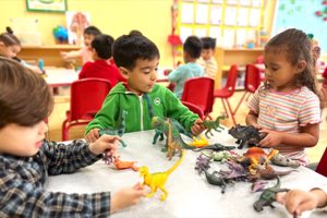 Pre-K children at Academy on the Hills in Aliso Viejo during a group learning activity